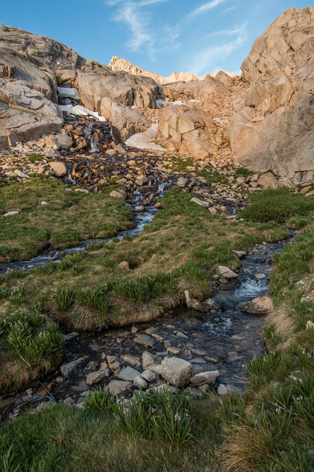 Green grass and slow melt along the 22-mile trail (Photo Courtesy Nick Flohr)